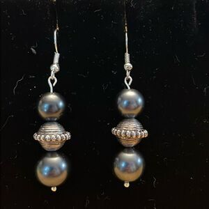 Handcrafted silver tone earrings with dark grey and silver beading.